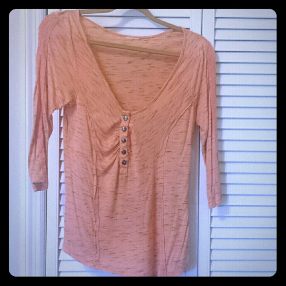 Woman's peach and gray top